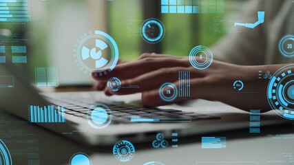 A close-up shot of hands typing on a laptop, surrounded by futuristic data visualizations and graphical elements, showcasing a modern and innovative workspace atmosphere. Xenic - Powered by Adobe