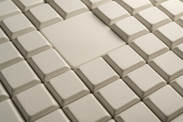 Unique tile pattern with a smooth central square on a neutral background showcasing modern design elements and texture