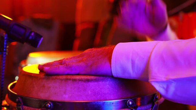 Exciting conga performance in vibrant setting at night