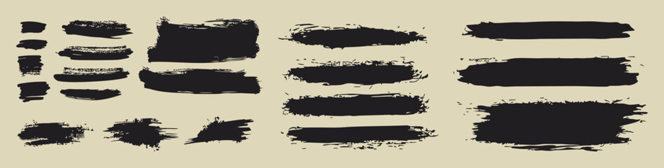 Collection of black paint brush stroke textures on a beige background. Set of grunge brush marks perfect for design, banners, and digital art. Bold artistic strokes with a rough, handmade look.