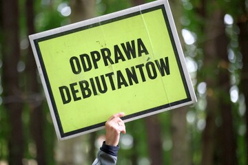 Hand-held Polish Sign for Debutants' Briefing on parkrun event