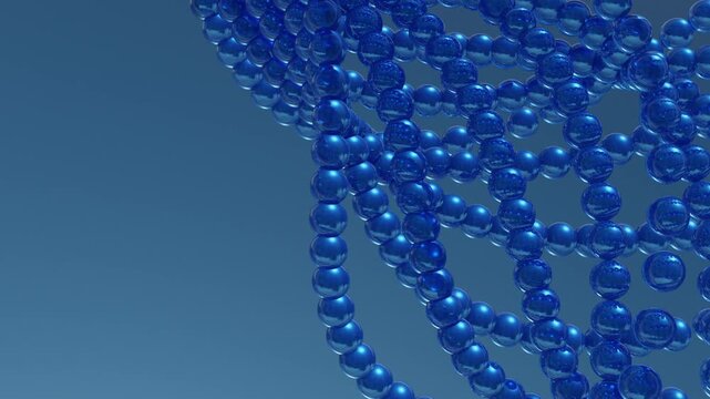 Abstract blue spheres forming a rotating molecular structure