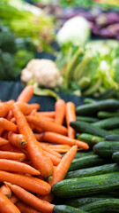 fresh vegetables at an open market stall