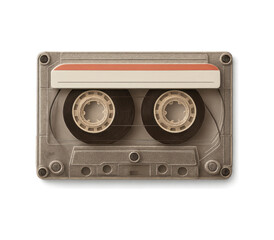 Vintage clear plastic audio cassette tape with orange and white label against a stark black background