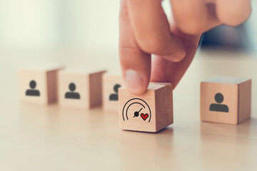 Soft Skills and Leadership concept. Building a team with emotional intelligence. Wooden blocks with...