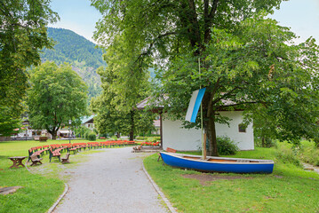 Bayrischzell spa gardens with open-air stage and fishing boat