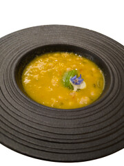 Beautiful and tasty food, dish of white beans and borage with purple flowers. Close-up shot on white background.