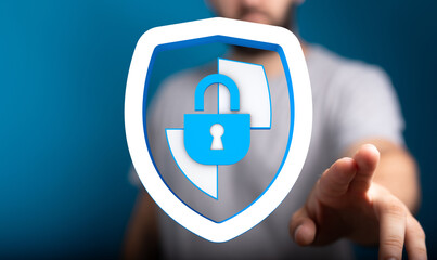 Abstract concept of digital security, featuring a shield, a lock, and a person's hand. Represents protection, safety, and online priv