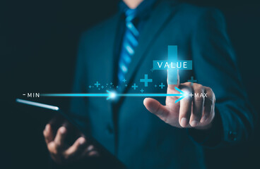 Businessman touching digital graph with value increasing from minimum to maximum, symbolizing business growth, performance improvement, profit optimization, and financial success.