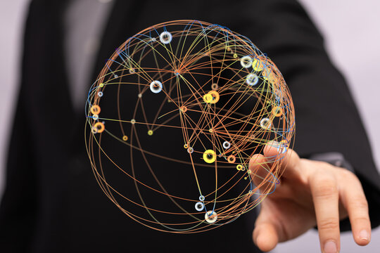 Close up of a businessman touching a digital globe network concept symbolizing connection, technology, global business, communication