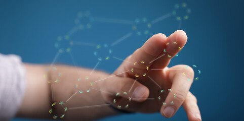 A close-up of a human finger touching a digital network connection. The image represents the concepts of technology, connection, inte