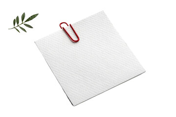 White Paper Square With Red Clip and Green Leaf