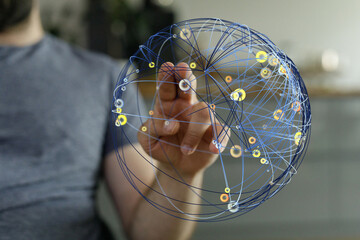 Hand touching a digital network sphere, concept of global connection, technology, and data transfer. Illustrating globalization and d