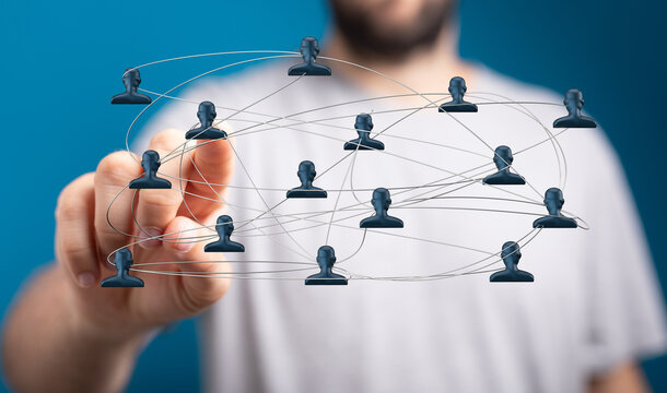 Concept of global connection or community illustrated by hand touching network. Ideal for business, technology, teamwork, and social media theme