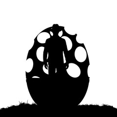 Silhouette of man standing inside large egg-shaped structure  