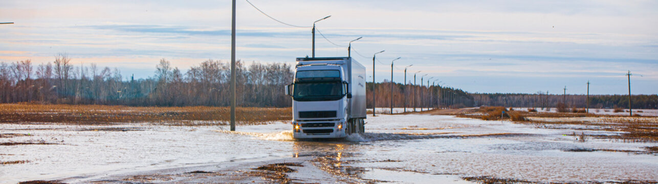 Flooded roads during floods and spring floods, blocked roads and highways, problems with roads and reinforced dams and levees
