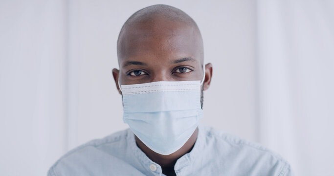 Portrait, black man and patient with face mask for healthcare, virus protection or safety in clinic. PPE, hospital and person with disease prevention equipment, medical wellness and infection control