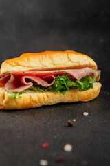 Ham sandwich green leaf salad, spam, meat snack vegetables natural product tasty tasty snack fresh delicious gourmet food background on the table rustic top view copy space