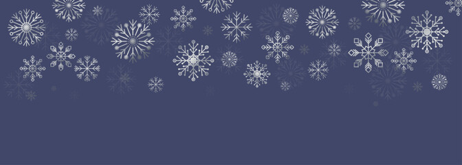 Winter abstract border made of silver snowflakes and frost crystals on navy background. Perfect for holiday cards, mailing, backgrounds, banner, and seasonal festive design