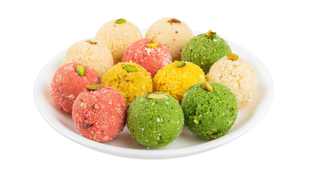 Round, white coconut sweets arranged in a flower pattern on a wooden plate