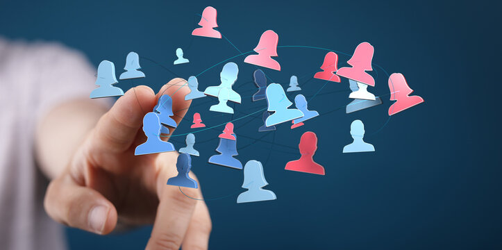 Hand pointing at connected people icons, representing social network, teamwork, business collaboration and communication.
