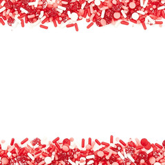 Vibrant candy sprinkle border featuring intricate red, pink, and white sweets.