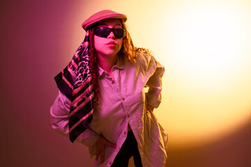 Woman wearing retro fashion outfit with scarf and cap