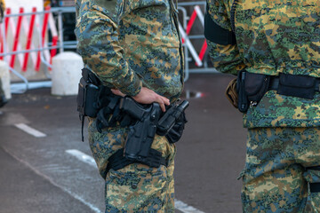 Fototapeta premium A close-up of army equipment shows details of the uniforms used by soldiers while serving in an urban environment.