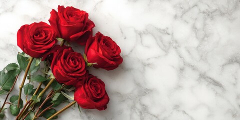 Elegant bouquet of red roses on white marble background, perfect for Valentine’s Day, wedding invitations, romantic backgrounds, and floral advertising designs.