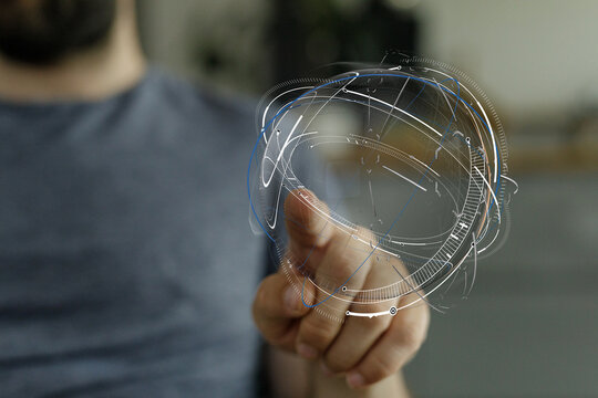 Person points at abstract sphere. Concept of global connection, technology, networking, and data visualization. Ideal for tech, communication, a