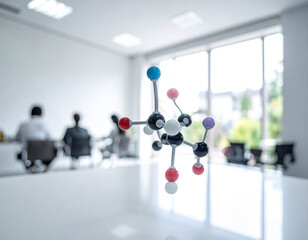 Molecular structure model in a conference room symbolizing scientific advancements