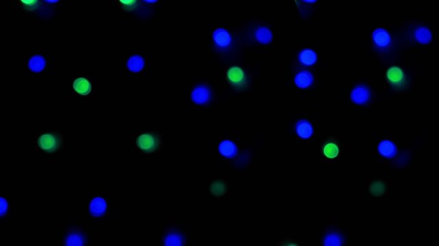 colorful bokeh lights on dark background provide perfect ambiance for romantic, festive or artistic themes in visual storytelling