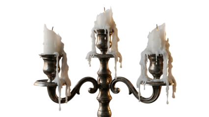 Ornate metal candelabra holds three white candles heavily coated in dripping, melted wax against a dark background