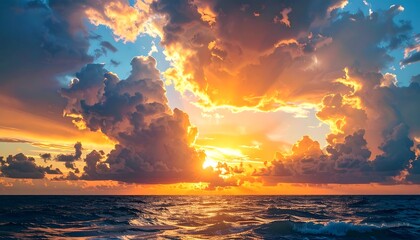 Oceanic sunset sky Sun rays pierce through clouds above a wavy ocean, casting gold hues