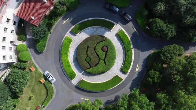 Aerial view  garden  surrounded by buildings and tree