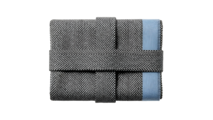 Fabric accessory folded neatly with a patterned texture and light blue accent secured by a central band