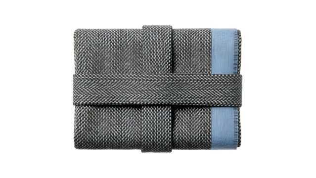 Fabric accessory folded neatly with a patterned texture and light blue accent secured by a central band
