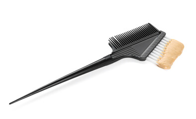 Brush with hair dyeing product isolated on white