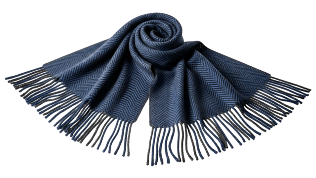 Folded woolen accessory displays rich herringbone pattern against a dark background