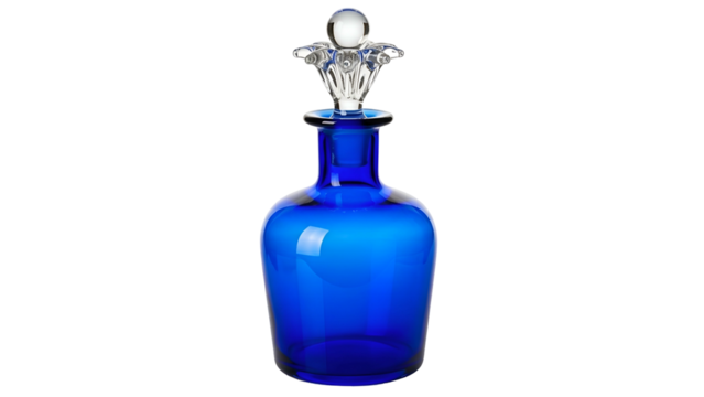Elegant cobalt blue glass decanter displays intricate clear stopper against a solid black background