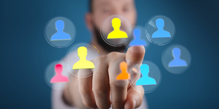 Connecting people, human resources concept. Hand pressing on a screen with people icons, networking, communication, teamwork and social media.