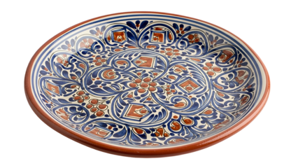 Ornate ceramic platter features traditional hand painted blue and brown decorative motif isolated on black
