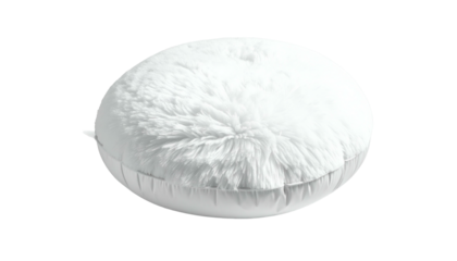 Round white fluffy cushion floats against a dark background