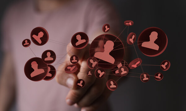 A networking interface showing the connection between people. Finger pressing on icons. 144 chars.