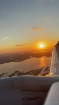Sunset sky over airplane wing vacation travel