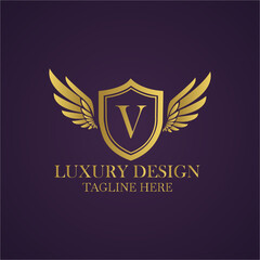 Elegant golden logo design with letter v, wings and shield on a dark purple background luxury design