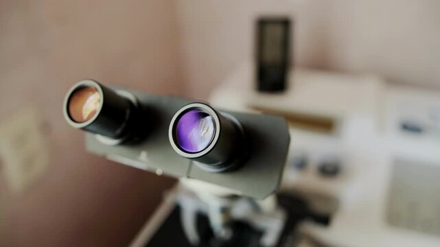 Modern microscope with multiple magnification in the laboratory of medicine for urology, hematology and histology. Medical equipment, close-up