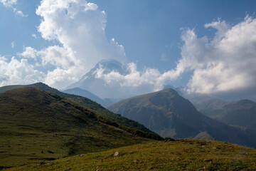 Fototapeta premium Kazbek in the clouds, Georgia