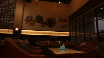 blurred abstract background of cafe lights