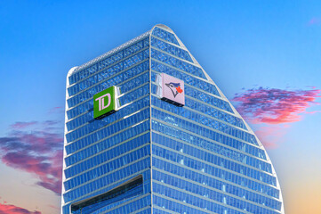 Fototapeta premium Financial distrct skyscraper with MLB Blue Jays logo during the World Series of baseball, Toronto, Canada